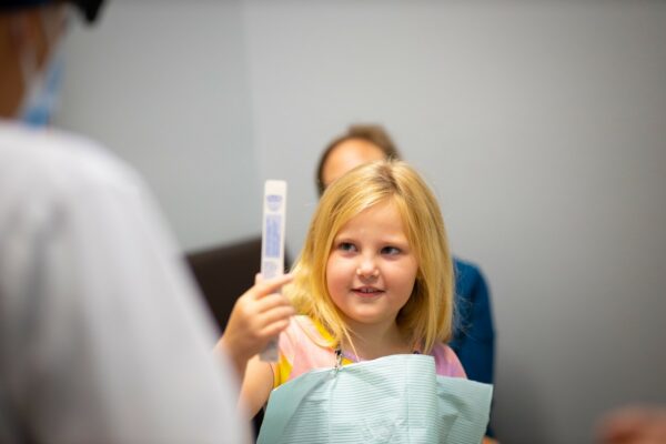 Patient Candids Beavers and Broomfield Dentistry 2020 Fayetteville Arkansas Dentist 600x400 - Which is Best for Me? Electric Toothbrush or a Manual One?